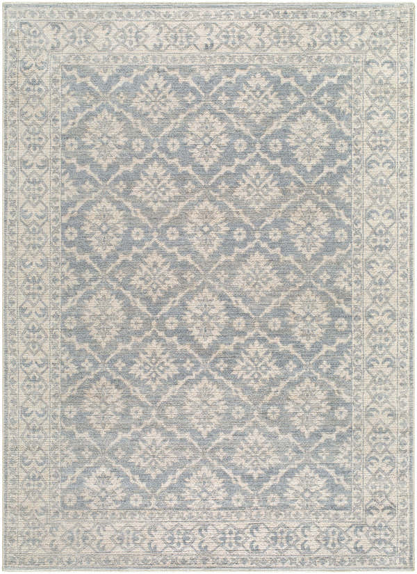 Close-up of the Aram Machine Woven Nabela Noor Home x LIVABLISS NBAR-2305 Area Rug, featuring a beige and pale blue traditional pattern. Design-Rectangle-527