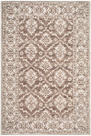 Close-up of the Aram Machine Woven Nabela Noor Home x LIVABLISS NBAR-2306 Area Rug. Features a traditional brown and gray floral pattern. Design-Rectangle-221