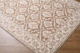 Close-up of the Aram Machine Woven Nabela Noor Home x LIVABLISS NBAR-2306 Area Rug. Brown and gray traditional pattern. Corner