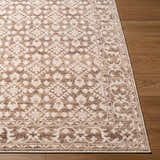 Close-up of the Aram Machine Woven Nabela Noor Home x LIVABLISS NBAR-2307 Area Rug. Brown, gray farmhouse style rug. Front