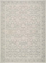 Close-up of Hewee Sage Persian rug. Machine woven jute rug with traditional floral pattern in sage, off-white, and mustard tones. Design-Rectangle-679
