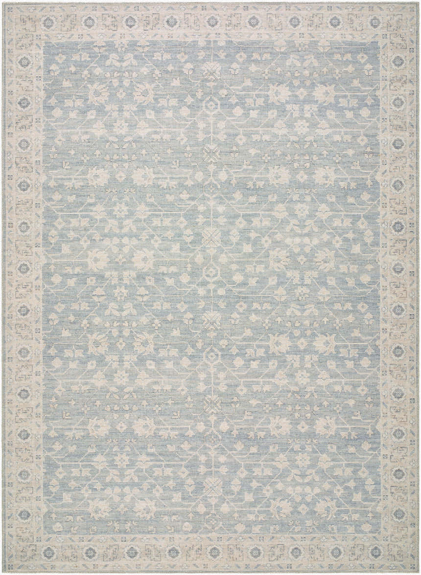Close-up of Asha Machine Woven Nabela Noor Home x LIVABLISS NBAS-2304 Area Rug. Sky blue and off-white traditional pattern. Design-Rectangle-679