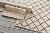 Close-up of the hand woven Syosset Cream/Brown Trellis Wool & Viscose Rug, showing its diamond pattern and wool texture. Styleshot