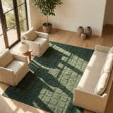Living room with beige sofa and chairs on a green Janina Washable Area Rug with a geometric design. Roomscene-Rectangle