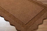 Close-up of the textured, hand-tufted Gurib Border Modern Wool Area Rug in a neutral brown color with a striped border. Corner