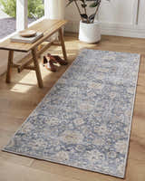 Entryway with a light wood bench and the light gray Metin Area Rug runner on wood floors. Roomscene-Runner