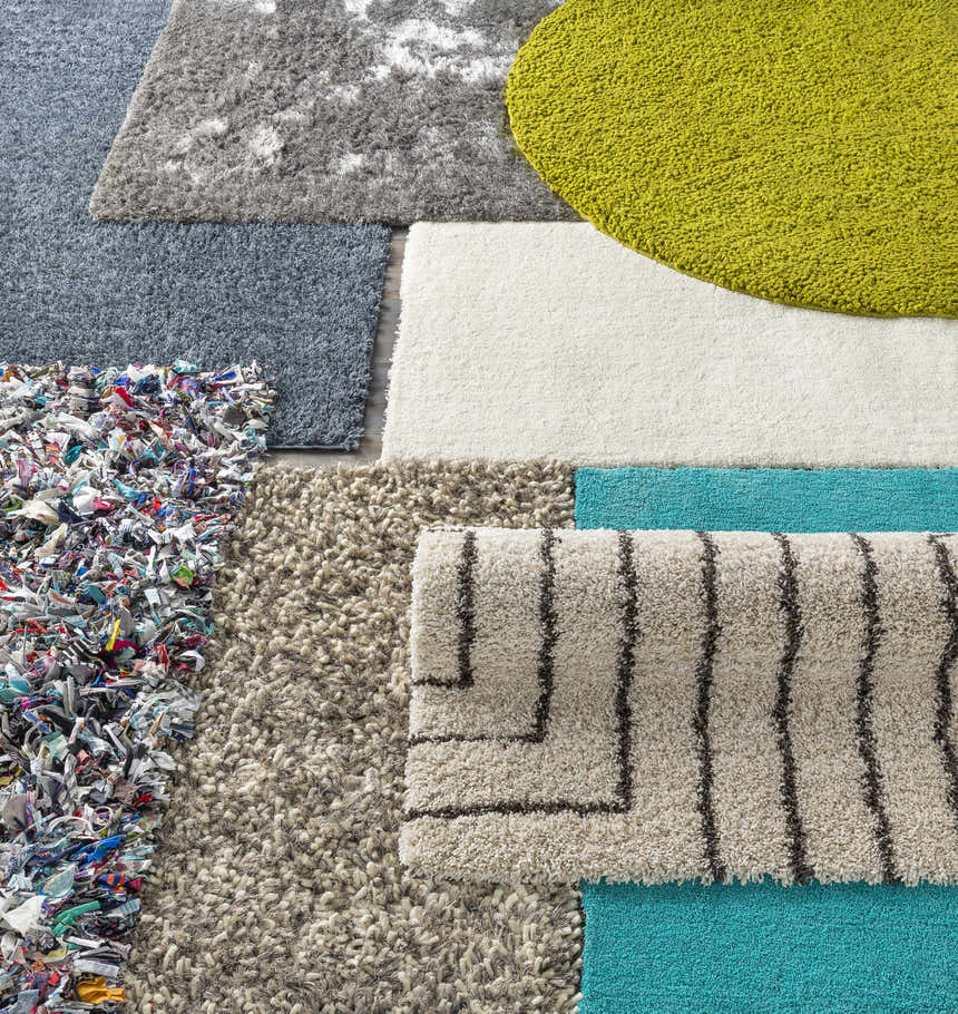 Variety of rug textures and colors, including a round Frederika Olive Green Wool Shag Rug. Styleshot
