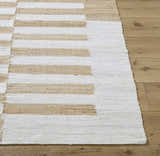 Close up of the hand woven Soren Area Rug featuring ash, light silver, and tan jute stripes. Front