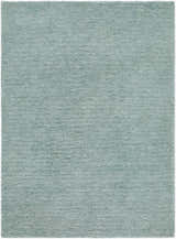 Close-up of the hand woven Kanuha Washable Area Rug. Sage green wool rug with a subtle, contemporary texture. Design-Rectangle