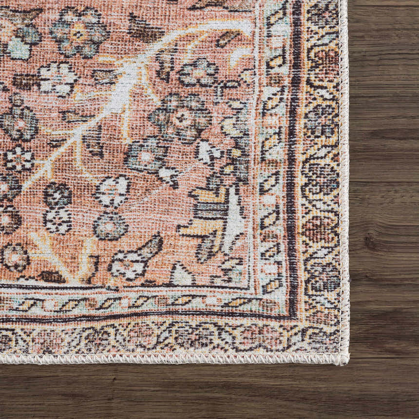 Close-up of the Flat Pile Urpi Red Washable Rug showing its Persian-style pattern and colors on a dark wood floor. Swatch