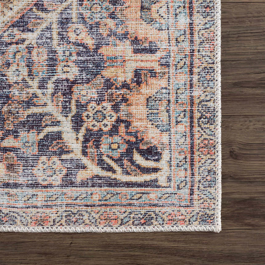 Close-up of the Konstantina Washable Area Rug showing its Persian-style pattern and colors like navy, peach, and aqua. Swatch