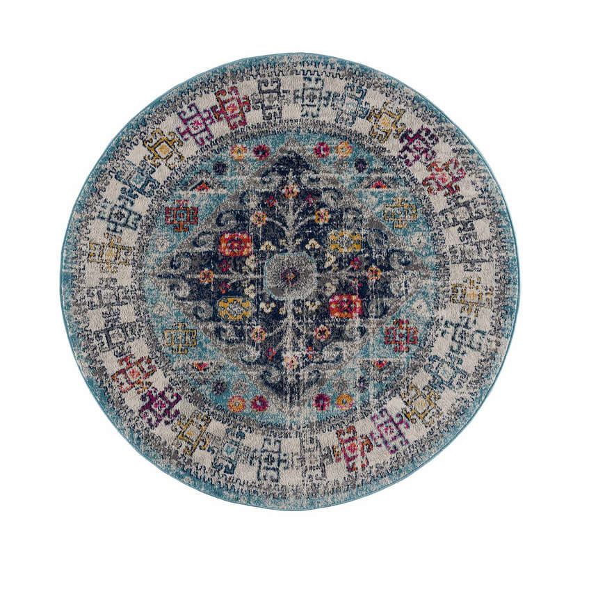 Round Tigris Turquoise 2314 area rug with a bohemian-inspired, colorful medallion pattern. Ivory, blue, pink, and mustard hues. Design-Round