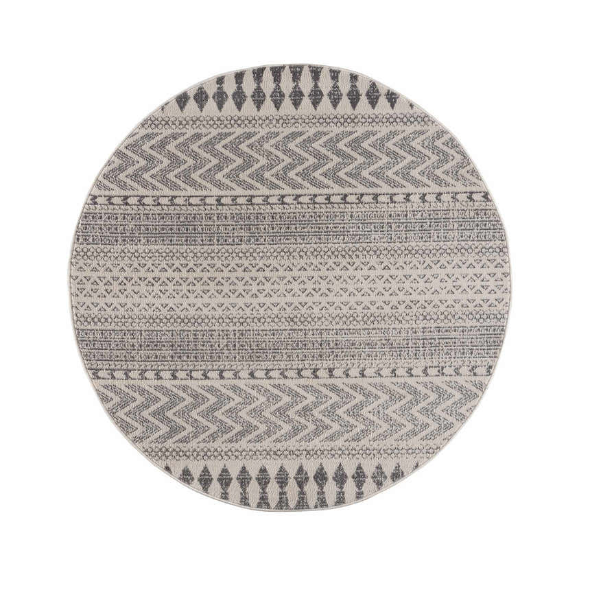 Close-up of round Tigri Aztec Ivory & Gray 2311 Rug. Features a gray geometric Aztec pattern on an ivory background. Design-Round