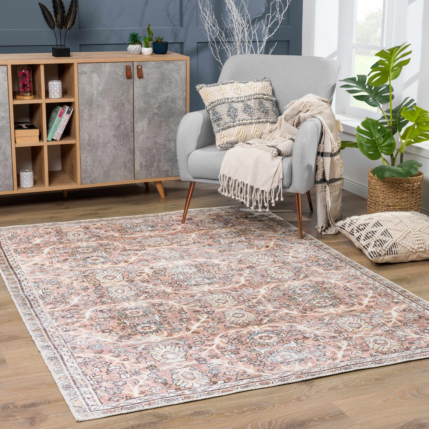 Living room scene with a Flat Pile Urpi Red Washable Rug, gray chair, wood cabinet, and indoor plant. Farmhouse style. Roomscene-Rectangle