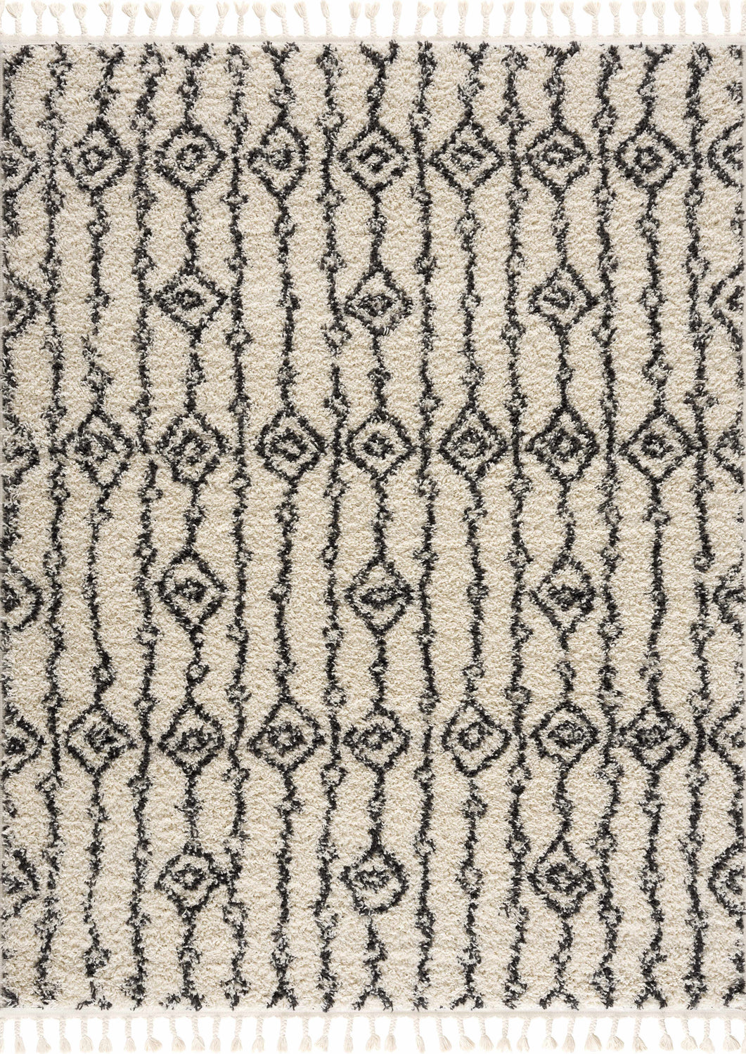 Close-up of the Bayanga rug, a shag rug with a black geometric Moroccan-inspired design on a light gray background. Design-Rectangle