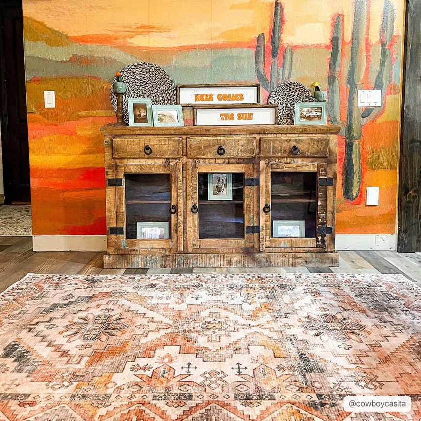 Living room scene with Southwestern decor and Isugod Washable Area Rug in beige, brick red, and black. Rustic wood console table. Roomscene-Rectangle