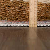 Close-up of Konstantina Washable Area Rug showing rug thickness with ruler. Features traditional Persian design and fringe. Pile