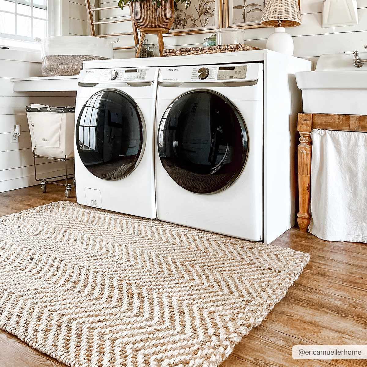 Farmhouse laundry room with white washer/dryer and natural jute Aren Area Rug featuring a geometric herringbone pattern. Roomscene-Rectangle