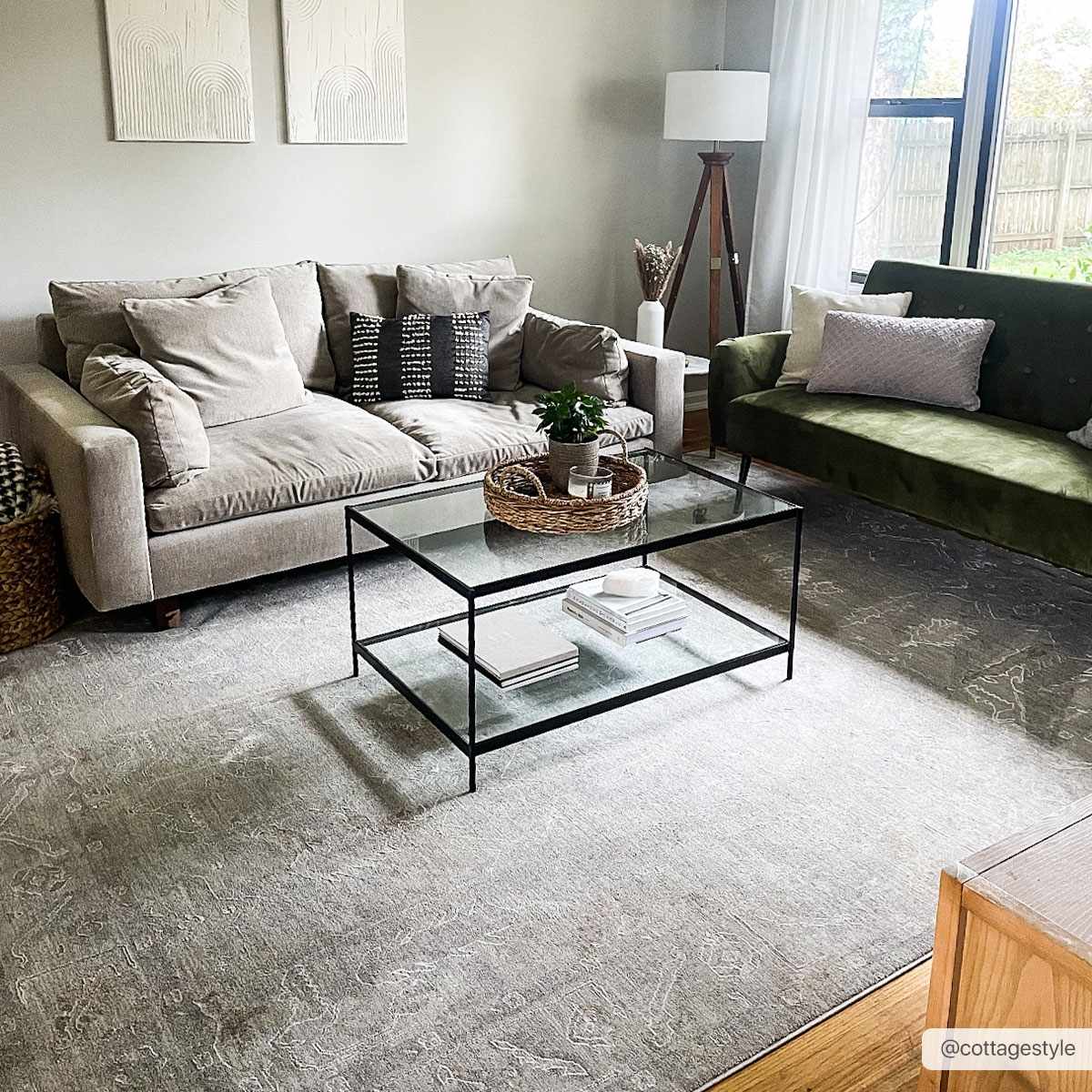 Living room scene with gray Ashra Thick Luxe Area Rug, neutral sofa, and glass coffee table. Farmhouse style. Roomscene-Rectangle
