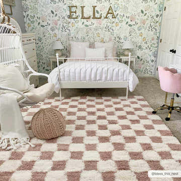 Kids bedroom with white bed, floral wallpaper, and the Atira Pink Checkered Shag Rug adding a playful, cozy touch. Roomscene-Rectangle