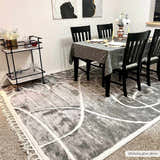 Dining room with Azana Modern Gray Area Rug, black chairs, gray tablecloth, and bar cart. Roomscene-Rectangle