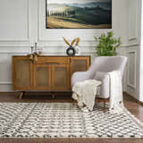 Living room scene with a Muni Berber Shag Rug, wood cabinet, gray chair, and Tuscan landscape art. Roomscene-Rectangle