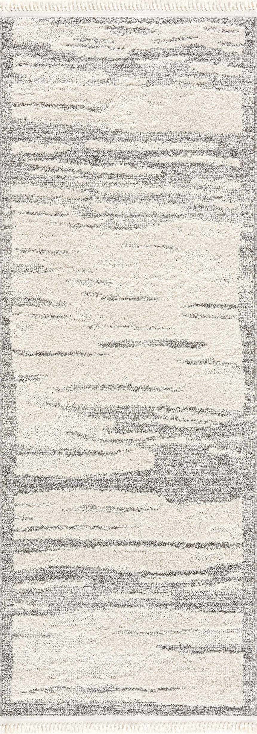 Close-up of Lave Bone & Taupe Area Rug. Neutral bone and taupe striped design with fringe. Contemporary style. Design-Runner