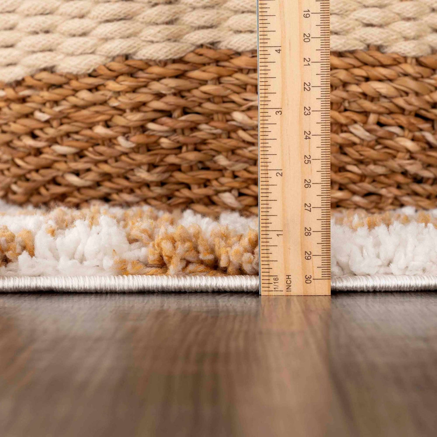 Close up of the Kieu Mustard & Ivory Checkered Area Rug showing its pile height and construction. Pile