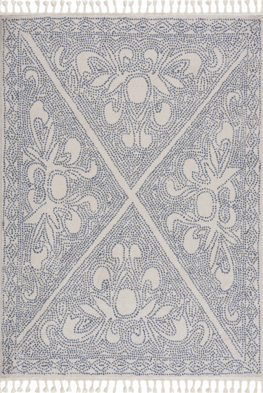 Close-up of the Birdwood Navy Area Rug, a cream rug with a blue bohemian-inspired pattern and tassels. Design-Rectangle-71010