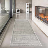 Modern living room scene with a Tigried Ivory & Gray 2323 Area Rug runner in front of a fireplace. Roomscene-Runner