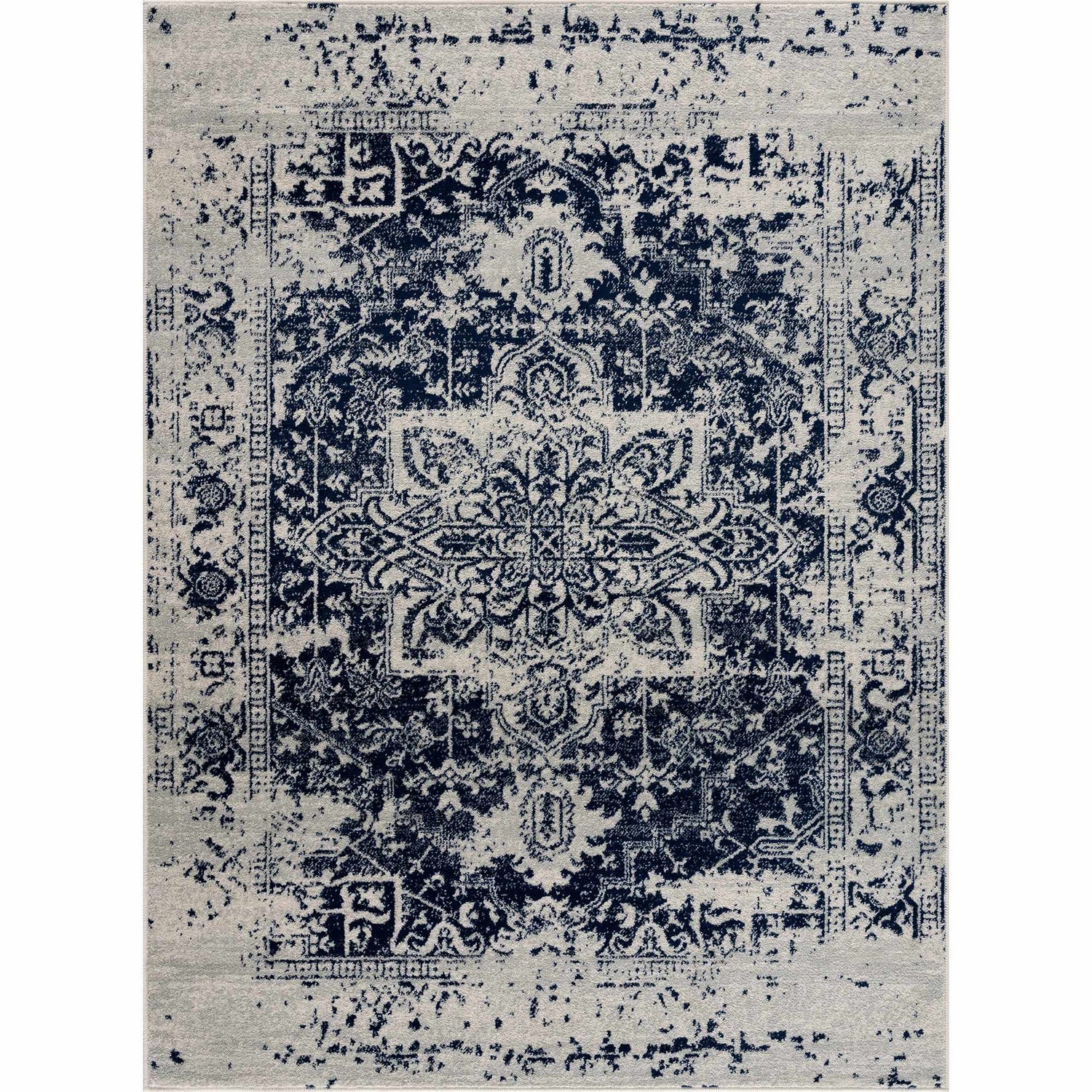 Close-up of the New Limestone Area Rug. Machine-woven rug in medium gray and navy with a traditional, distressed pattern. Design-Rectangle