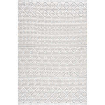 Close-up of the Ivory Beil 3D Fringe Area Rug. Features a geometric trellis pattern and fringe, in shades of ivory and white. Design-Rectangle