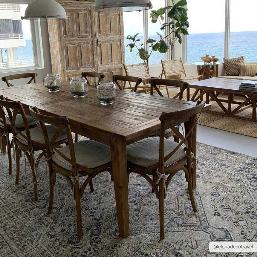 Coastal dining room with a rustic wood table on the Barny Tan Washable Area Rug. Roomscene-Rectangle