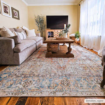 Living room with beige sofa and Beck Peach Washable Area Rug in beige, blue, and brown tones. Roomscene-Rectangle