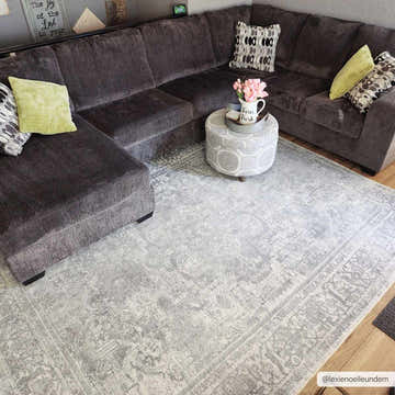 Living room scene with charcoal sectional and Blue Hiti Washable area rug. Farmhouse style with oriental pattern. Roomscene-Rectangle