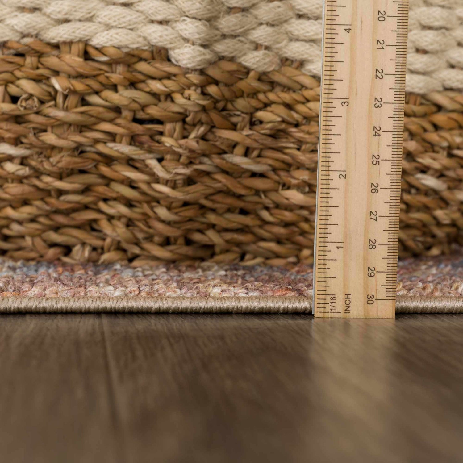 Close-up of the Anshu Peach Washable Area Rug showing beige, blue, and burgundy colors with traditional vintage design. Pile