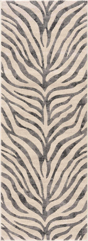Close-up of the Gray Ecorse Zebra Print Area Rug, featuring a black, charcoal and light beige animal pattern. Design-Runner-2773