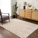 Living room scene with a beige Manteca Zebra Print Area Rug, gray chair, and wooden cabinet. Roomscene-Rectangle