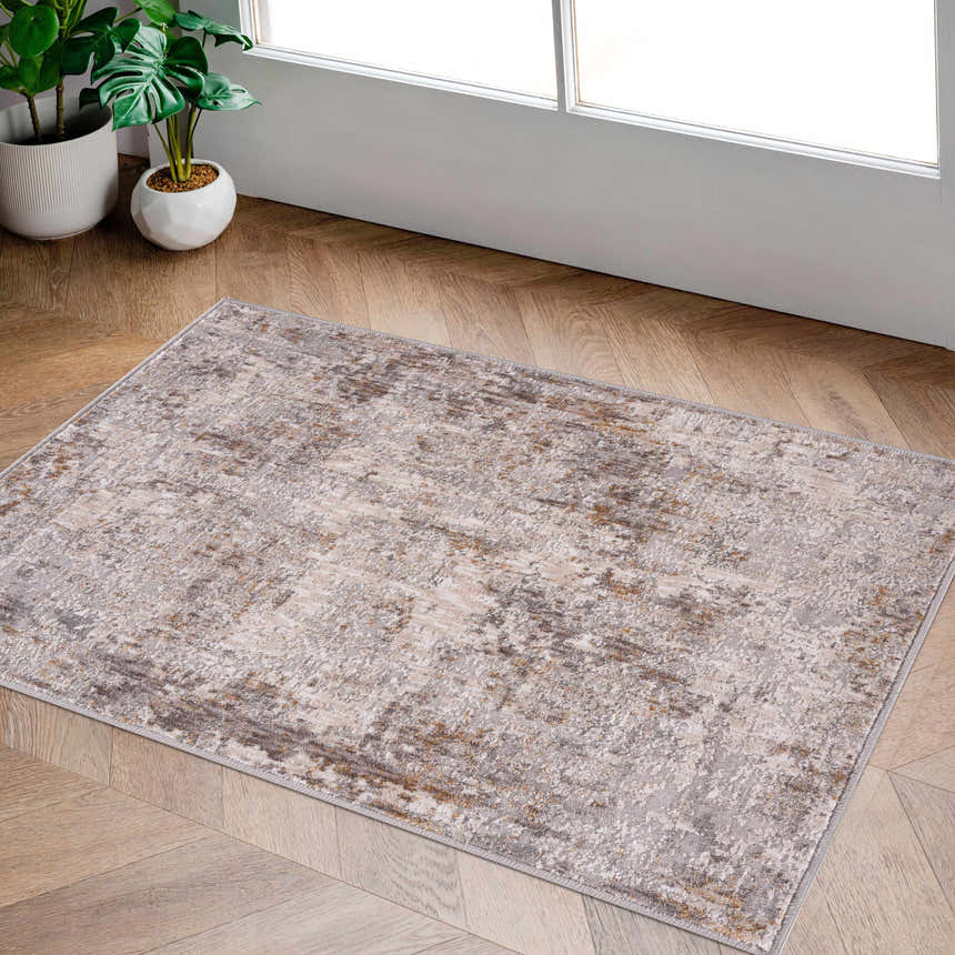 Entryway with light wood floors and the gray, brown, and off-white Dowell Luxe Textured Area Rug. Roomscene-Rectangle