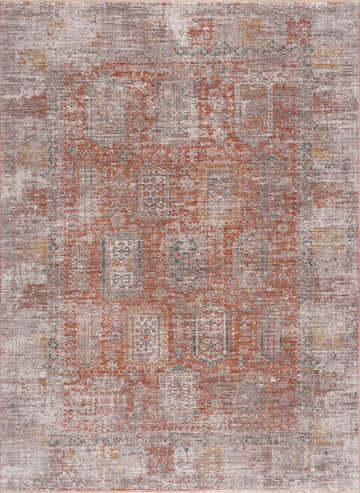 Close-up of the Casta Area Rug. Farmhouse style rug in beachhouse, garnet, and dark beige colors with a traditional pattern. Design-Rectangle-5376
