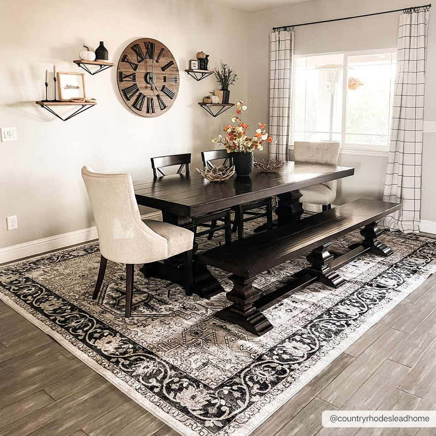Farmhouse dining room with dark wood table and Cabacungan Washable Area Rug in black, gray, and beige. Roomscene-Rectangle