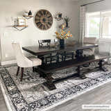 Dining room with dark wood table and Cabacungan Washable Area Rug in black, gray, and beige. Bohemian farmhouse style. Roomscene-Rectangle