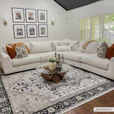 Living room with a neutral sectional sofa and the black and beige Cabacungan Washable Area Rug. Roomscene-Rectangle