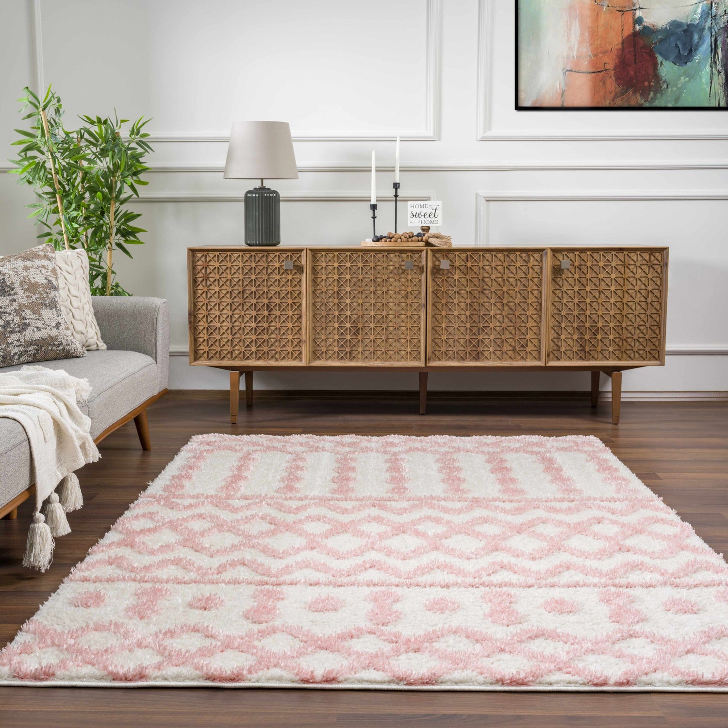 Living room scene with a pink and white patterned Darva Pink Plush Area Carpet. Roomscene-Rectangle