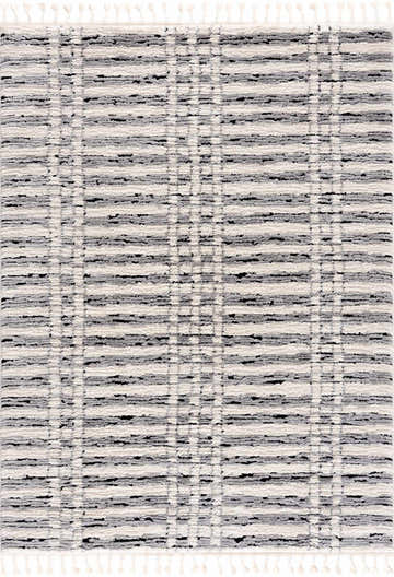 Close-up of the Nava Area Rug. Beige, bone, and black geometric pattern with a soft, textured, machine-woven pile. Design-Rectangle-46