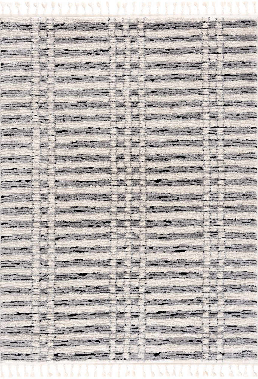 Close-up of the Nava Area Rug. Beige, bone, and black geometric pattern with a soft, textured, machine-woven pile. Design-Rectangle-46