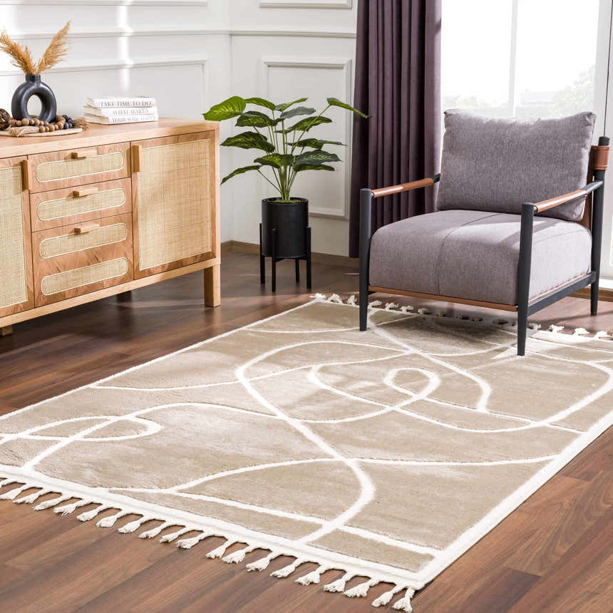 Living room scene with a cream Azana rug, wood cabinet, gray chair, and dark wood floors. Roomscene-Rectangle