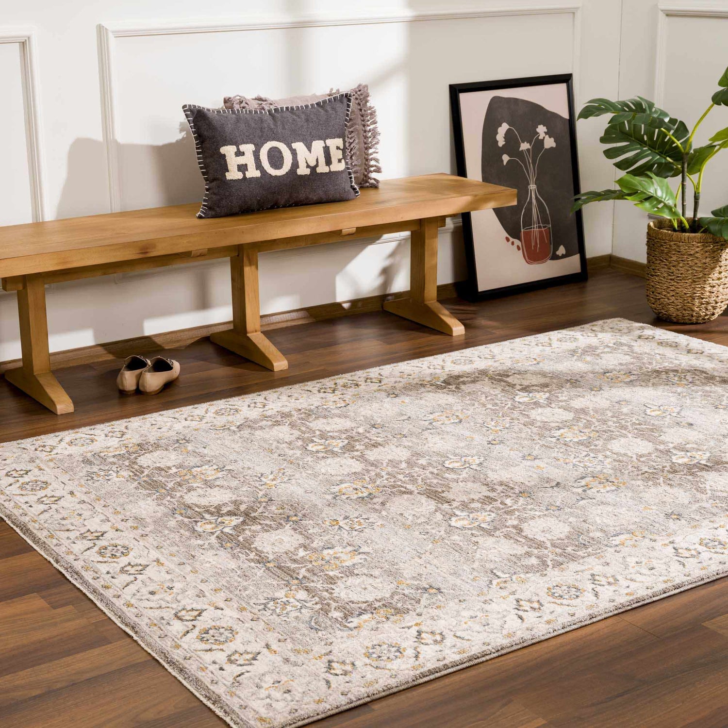 Entryway with Amaru Green Textured Rug, wooden bench, HOME pillow, art, plant, and shoes on dark wood floor. Roomscene-Rectangle