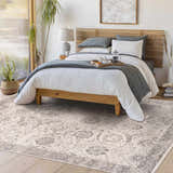 Bedroom scene with a Gauge Cream & Gray Blue Rug. The rug adds a traditional, farmhouse style to the light-filled space. Roomscene-Rectangle
