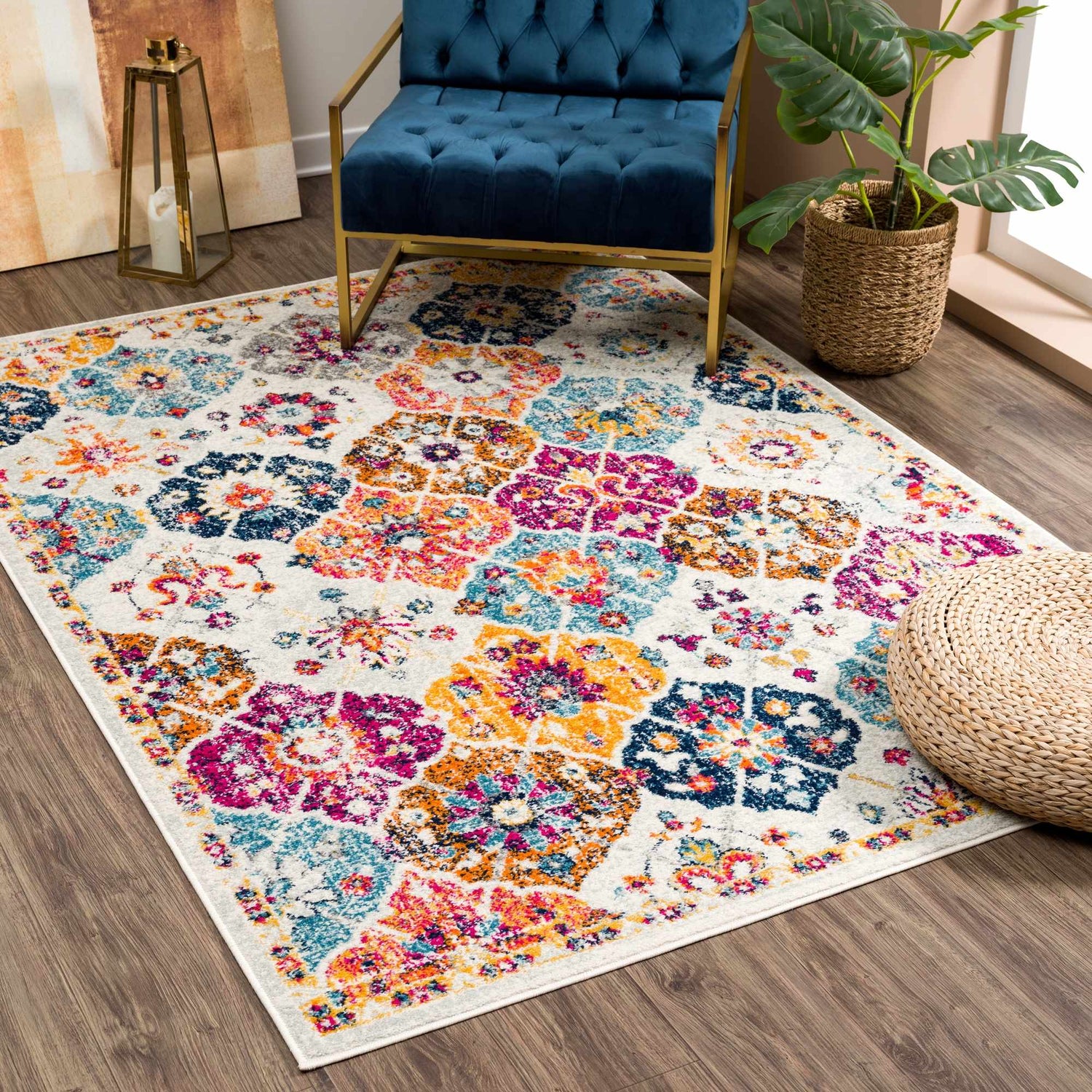 Living room scene with New Custar Area Rug. Colorful floral pattern with burgundy, orange, navy, mustard, and teal accents. Roomscene-Rectangle